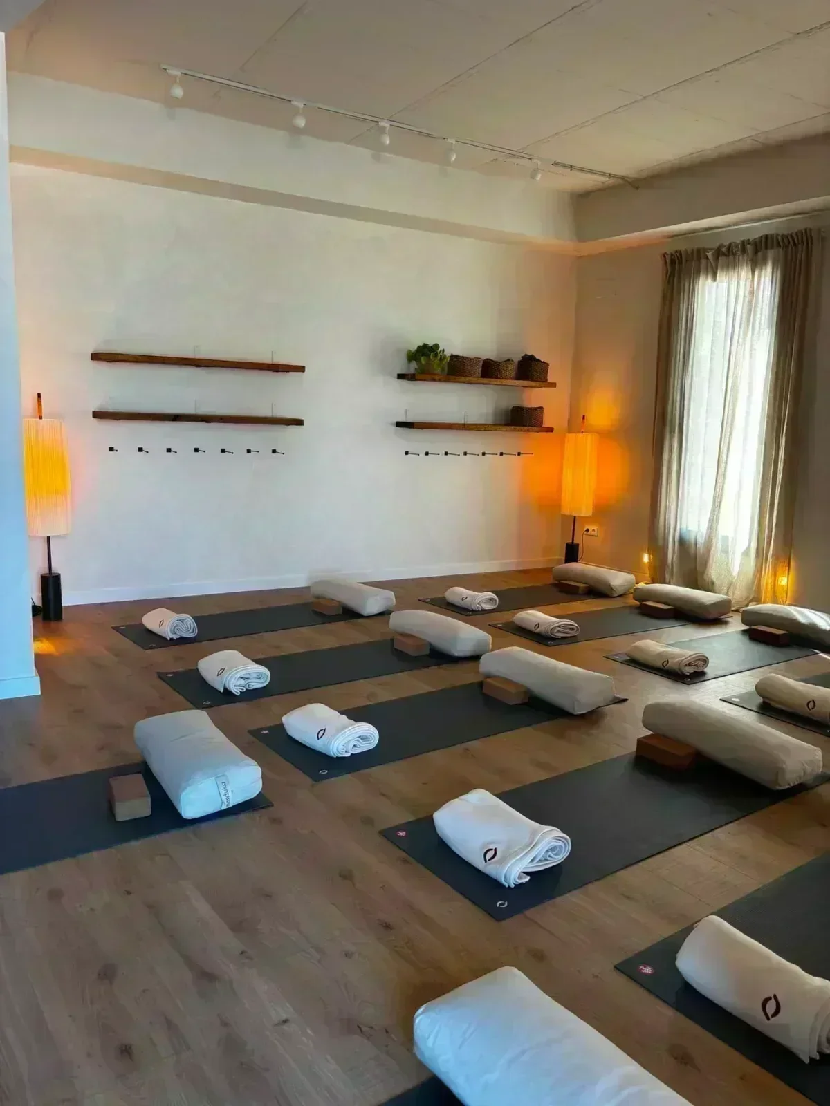 YogaBond main room with mats and bolsters prepared